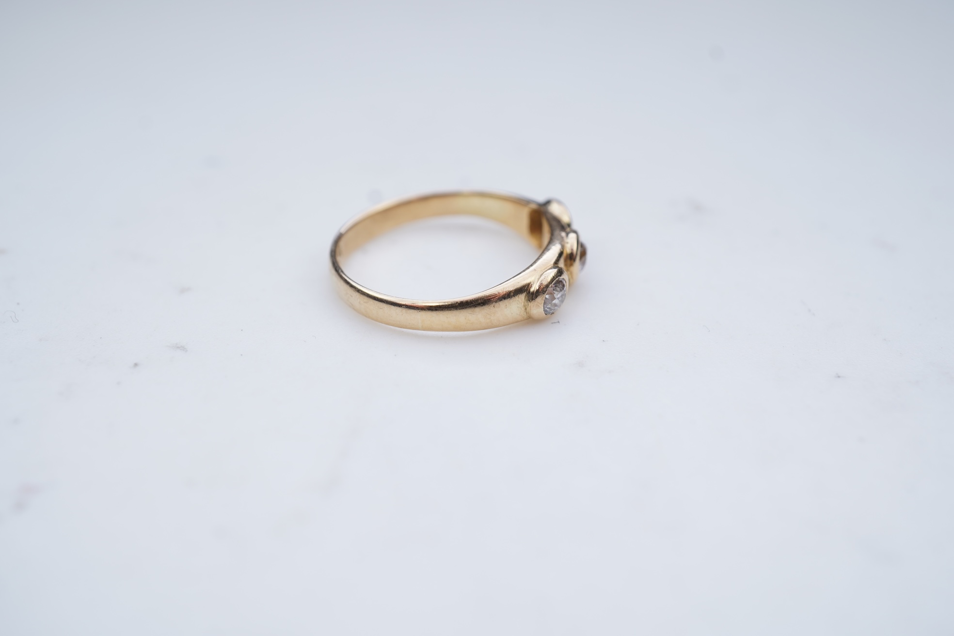 A three-stone diamond ring